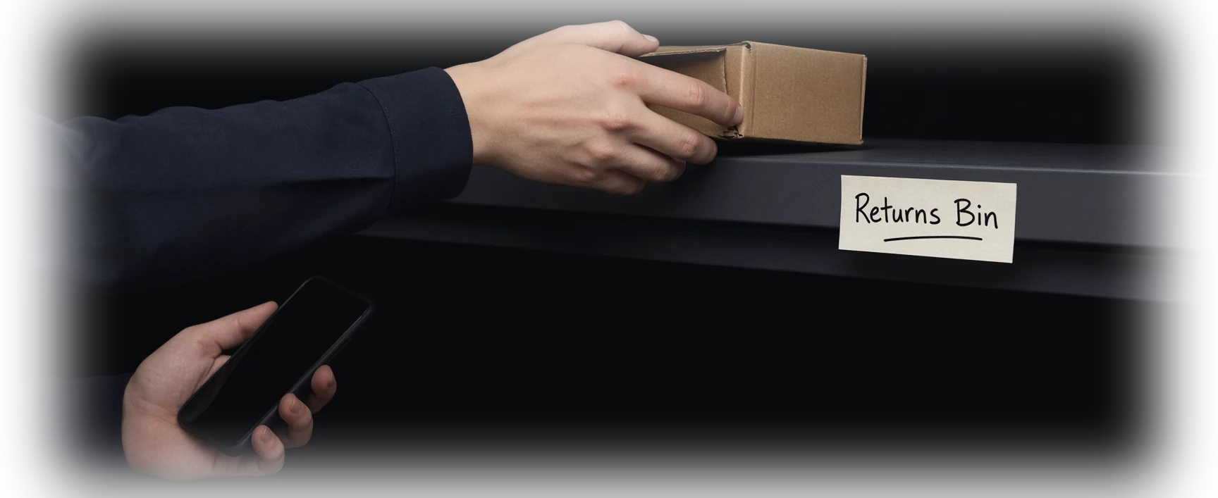 A picker scanning a shelf with a phone